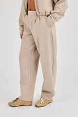 Gewebte Hose mit ausgestelltem Bein – Beige