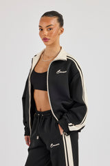 Trainingsjacke mit kontrastfarbenem Kragen – Schwarz