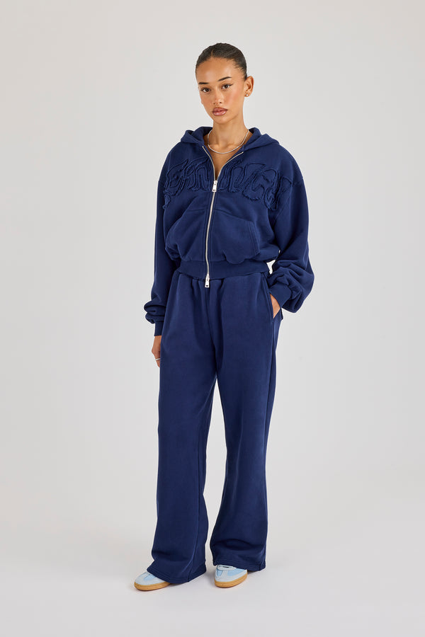 Kapuzenpullover mit gewaschenem Logo-Applikationen, kastenförmigem Schnitt, durchgehendem Reißverschluss und weitem Bein, Marineblau