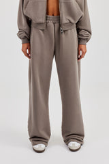 Jogginghose mit weitem Bein und Applikationslogo (verwaschen) – Grau