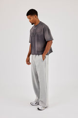 T-Shirt mit verwaschenem, besticktem Muster - Grau