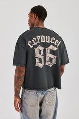 T-Shirt mit verwaschenem Print und kastigem Schnitt - Anthrazit