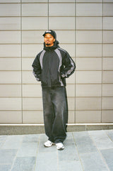 Trainingsjacke aus Nylon mit Einsätzen - Schwarz