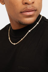 Tenniskette mit Blumendetail und Eisblumen - Gold