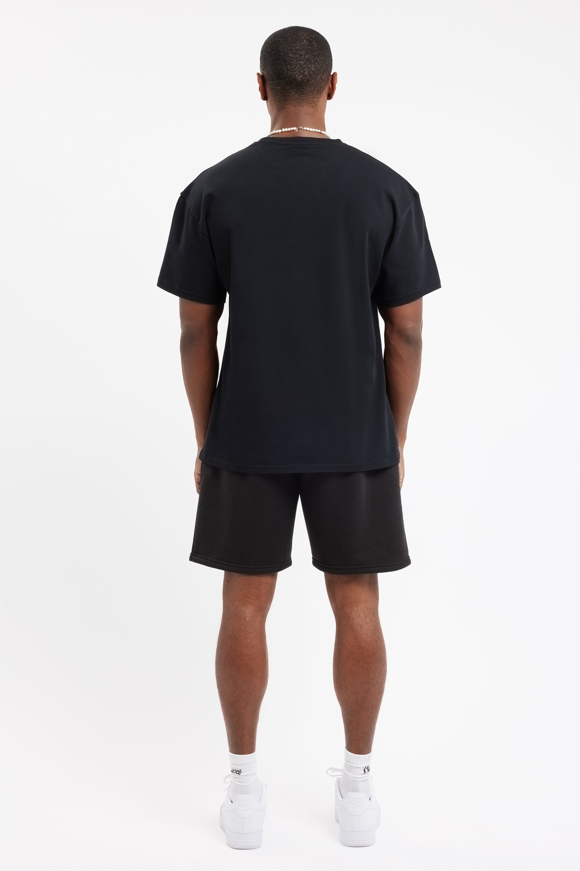 Oversize-T-Shirt mit Cernucci-Text - Schwarz